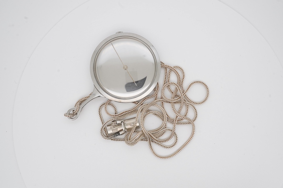 A Danish stainless steel Vivianna Torun for Georg Jensen pendant watch, on a 925S Georg Jensen chain, numbered 958, 78cm. Condition - fair to good